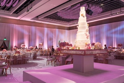 San Diego-based bakery Sweet Cheeks Baking Co. creates custom wedding cakes, including a 10-foot cake—the largest the company has ever created—that served as a centerpiece during a reception. The massive dessert consisted of vanilla cake with cream cheese frosting.
