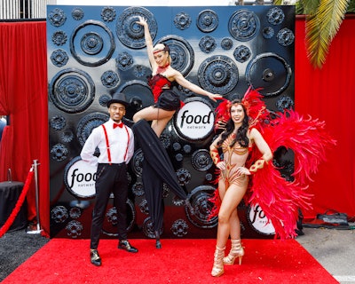 An all-black, wheel-covered step-and-repeat was inspired by Fieri's love of cars.