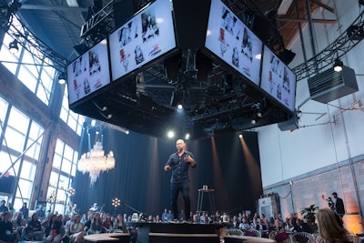 The Cabaret-Quebec space gave attendees a new C2 environment to interact with speakers. The space mixed cabaret-theme candelabras, seating, and other decor to contrast with a high-tech, 360-degree stage. The circular stage was designed to cater to multiple speakers participating in post-talk Q-and-As, in which they could separately take audience questions at the same time.