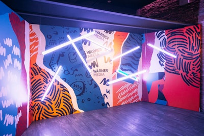 Samantha Silverman, AGENC's associate director of production, said the creative theme was 'vibrant and daring layers.' Design elements included a branded wall with pop-art inspired graphics and neon light fixtures.