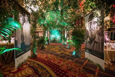 HMR Designs handled decor and built the 'Garden of Hope' to help connect guests to the evening's cause. Designer Rishi Patel used 'swarms of smilax vine' to create a space that highlighted key individuals or corporations inside the installation.
