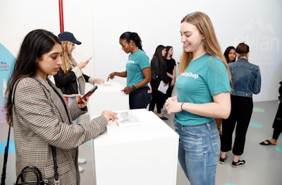 Located at industrial pop-up 393 NYC on Broadway in Tribeca, Evian hosted a pop-up that lasted four hours to celebrate the U.S. arrival of its limited-edition 'One Drop Can Make a Rainbow' glass bottle designed by Virgil Abloh. Guests received a white ticket upon arrival, which they then held in the stream of a water fountain to reveal if they had won one of 10 signed bottles.