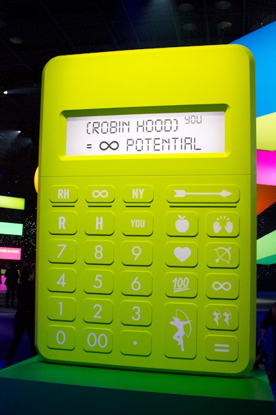 An oversize calculator was customized with buttons such as the Robin Hood logo, the infinity sign, and letters representing the event theme.