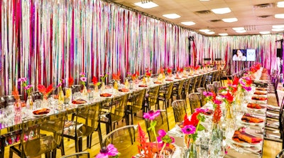 The Inside Jewelry room featured two long tables surrounded by curtains of metallic streamers.