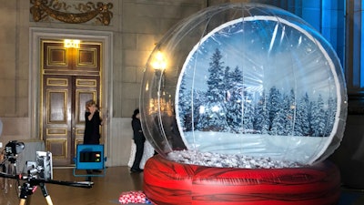 The Giant Snow Globe creates a truly memorable photo booth experience for guests of this Amazon holiday party at the Andrew W. Mellon Auditorium.