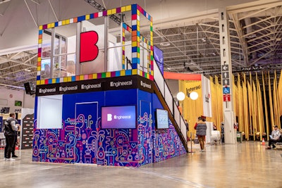 On the activation floor, Mirrored Media produced an activation for Builder by Engineer.ai, which helped facilitate conversations with customers in three different ways: mass communication, intimate conversations, and individual sales meetings. The two-story structure included two open meeting spaces and five private meeting rooms with computers and screens.