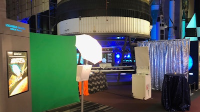 The Strip Photo Booth and the Picture Perfect Photo Booth with a Green Screen upgrade at the National Air and Space Museum in Washington D.C. for a corporate event created by Hello DC Destination Management Company.