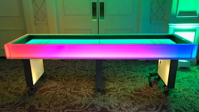 The LED Shuffleboard creates a vivid spectrum of colors for a Mitzvah Showcase at Woodholme Country Club in Pikesville, MD.