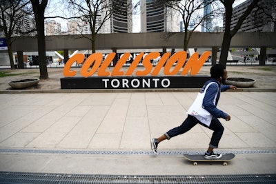 A fabricated sign for the conference stood outside of Toronto's City Hall.