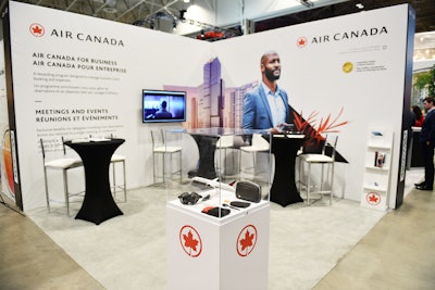 Air Canada showcased its business travel offerings by displaying in-flight perks and information about the company's rewards program and discounts on flights for meetings and events. The booth was created by Air Canada's creative studio and brand team.