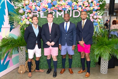 A floral wall set an island vibe—as did event representatives in signature Bermuda shorts.