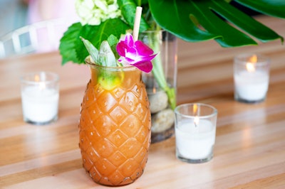 The Somerset Swizzle, served in a pineapple-shaped glass, featured three Bermudan-borne Goslings rum varieties plus wild Surinam cherry liqueur, mango, pineapple, assorted Bermudan citrus, and bitters.