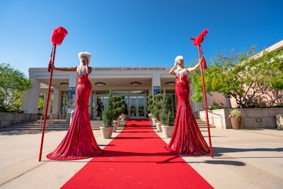 MPIOC hosted its awards and installation dinner at the Richard Nixon Library & Museum in Yorba Linda on June 12. The red carpet was flanked by live entertainers from Champagne Creative Group, while the pink-hued dining space was inspired by Nikolo Kotzev’s Nostradamus Rock Opera and Sofia Coppola’s Marie Antoinette. Elite Productions International handled event design and florals, while rentals came from Bright Event Rentals.