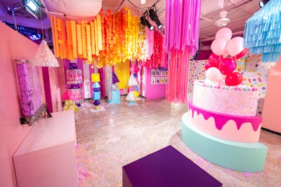 The “Celebration Room” touches on the fact that rosé is a popular wine for events such as birthdays and graduations. The features include glitter cannons, confetti imagery, and a photo op where guests can jump out of a fabricated giant cake. The room also has a wall with oversize birthday cards that display facts about sparkling wines.