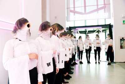 Attendees were greeted by servers wearing fish masks.