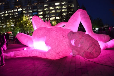 Outside of the venue, artist Max Streicher inflated his large-scale kinetic sculptures entitled Sleeping Giants.
