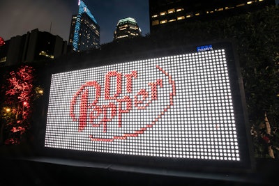 Tying into the retro theme was an oversize Lite Brite, plus LED swing sets.