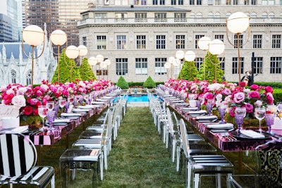 “The venue overlooks Fifth Avenue and St. Patrick’s Cathedral, and it was breathtaking in design. For the wedding, we completely transformed the New York Public Library. We created these walls made of oversize printed white roses that were each 8 feet in circumference.” Pictured: Rehearsal dinner at 620 Loft & Garden