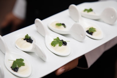 Celery root and apple panna cotta with truffle caviar spoons was presented by the St. Regis at a collaboration dinner between Rick Bayless and Jason Vincent.
