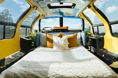 The front of the vehicle has a fold out bed that accommodates two people.