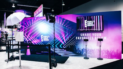 In another area inspired by the People’s Choice Awards on E!, attendees could walk down a black carpet and pose for photos and then write in their choices for the awards.
