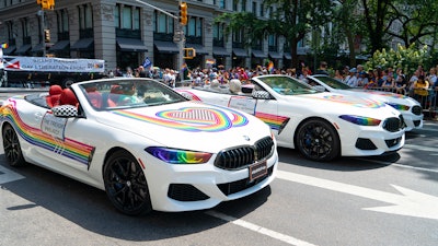 As part of BMW’s #GoWithPride campaign, the automotive brand partnered with designer Jonathan Adler to design a custom fleet of Pride BMW 8 Series convertibles. Rainbow wraps formed a heart on the front of the vehicle. BMW's media agency Anchor Worldwide partnered with Enhance a Colour to create the vehicle wraps.