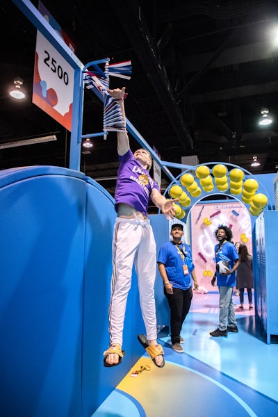 In another photo-friendly room, guests tried to beat Steph Curry in a virtual basketball game and challenged friends to a jump contest. A third space, called the “chill room,” had a hot tub and a confessional video booth.
