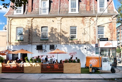 Bar Aperol is open at 1030 Queen Street West throughout July. The pop-up bar serves Aperol Spritz cocktails, an Italian aperitivo food menu by the Cheese Boutique, and coffee by Lavazza.