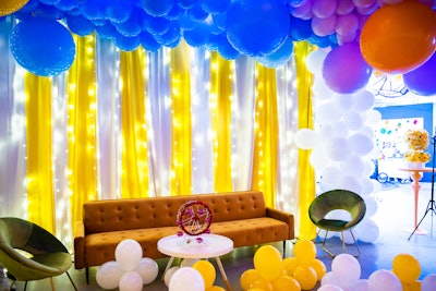 Additional balloons decorated seating areas.