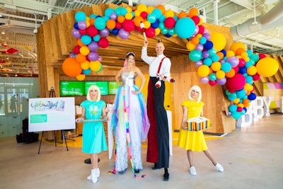 Decor and entertainment was inspired by the Santa Monica Pier, with jugglers, stilt walkers, and caricature artists.