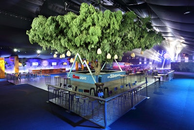 The party’s central focal point was a tree that spanned 70 feet in diameter with a trunk constructed from fiberglass. The 600 branches had been trimmed from trees on a farm, which producers describe as a natural process to help the trees grow stronger and longer. After the ESPYs party, the branches were repurposed as landscaping. Below the tree was a bar from sponsor Coors Light that was framed with mountain archways.