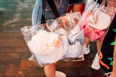 Hats and other merchandise could be stored in plastic tote bags, which had four customization options mimicking Stories stickers: Lit, Yaas, Savage, and Bye.