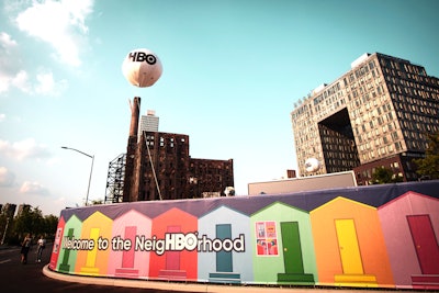 HBO’s second Stay Home to the Movies event took place July 26 to 28 at Domino Park in Williamsburg, Brooklyn. The event enticed passersby with a branded balloon and colorful perimeter displaying the tagline, “Welcome to the NeigHBOrhood.”
