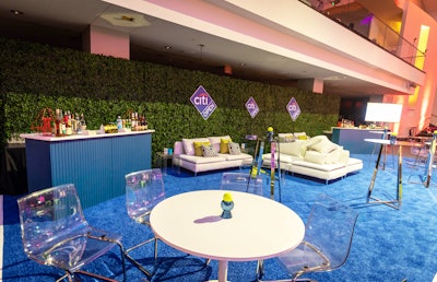 Longtime Rammys sponsor Citi Open created a garden party-esque lounge with faux topiary, white furniture, and tennis balls as table toppers. Design Foundry created and executed the lounge.