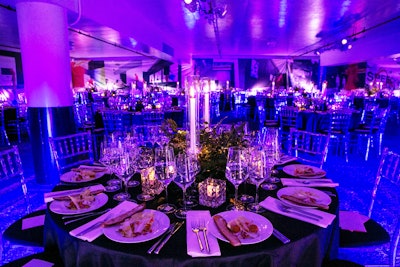 Gala organizers contrasted the gritty parking garage venue with glamorous tabletops.