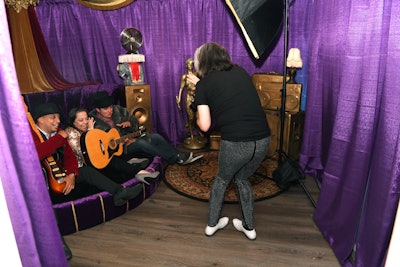 A rock 'n' roll-theme room was decorated with purple velvet curtains and seating, and it offered rock star costumes for photo ops.