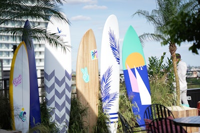 Colorful surfboards served as a deconstructed photo wall for guests.