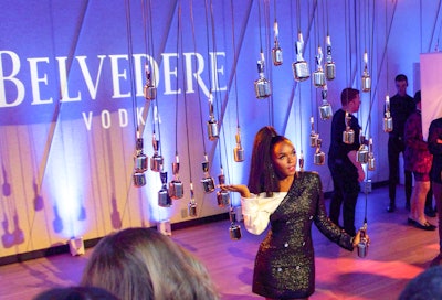 Guests including Janelle Monáe posed with hanging microphones.