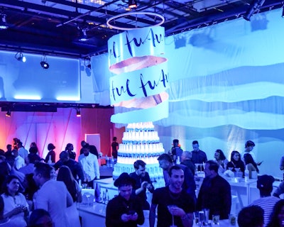 The event centerpiece was a tower of vodka bottles surrounded by a spiral displaying the name of the collaboration.