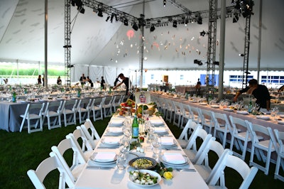 More than 500 guests made their way into the dinner tent with an installation and performance by Bianca Casady of CocoRosie and Ira Anufrieva. The centerpiece featured a chandelier-like structure adorned with designer shoes while the vegetarian menu consisted of family-style dishes such as wild morels and chilled jicama and ginger pho broth and red coconut curry.