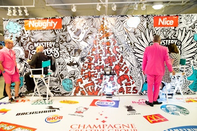 Champagne Creative Group also showcased its 'Mystery Tattoo Wall' on the show floor. Guests could stick their arms into a hole in the wall to receive a tattoo made from electronic ink. The tattoos last three days, or can be washed off with soap and water; tattoos can be customized with company logos or other messages.