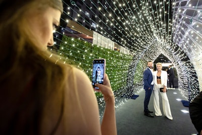 At the event entrance, guests could take photos in a tunnel of twinkle lights.