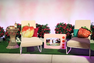 Guests could pose for photos on vintage lounge chairs situated in 'strawberry garden,' a re-creation of the look of Absolut's ad campaign with Lizzo.