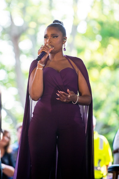 Jennifer Hudson headlined the gala, taking the stage alongside the Chicago Symphony Orchestra. The vocal powerhouse entered the pavilion through the back, shaking guests' hands as she made her way to the stage. As she walked, Hudson sang 'How Great Thou Art.'