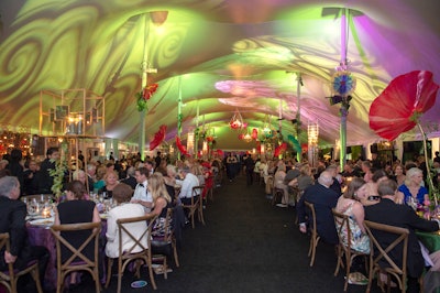 Kehoe Designs provided decor for a tented dinner that followed the performance. Some 800 guests sat for dinner in an 80- by 220-foot tent erected on the lawn. The tent was constructed over the course of seven days and was accompanied by a 20- by 110-foot food prep area.