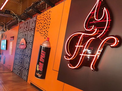 Cheetos branding was creatively incorporated into a beauty-theme decor wall.