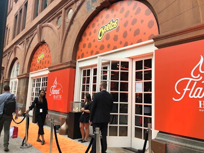 The Cheetos 'House of Flamin' Haute' took place September 5 to 7 at the Altman Building. The opening night event rolled out an orange carpet for entrances.