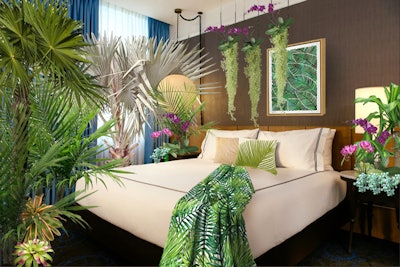 The Palm Room will have a tropical feel, replete with live plants and palm-leaf-print pillows.