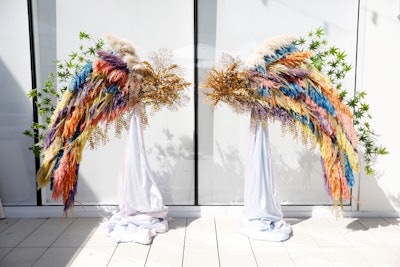 Angel wings made from flowers—curated by cannabis floral designer Leslie Monroy from Flowers On Flowerz—provided an ethereal photo op.