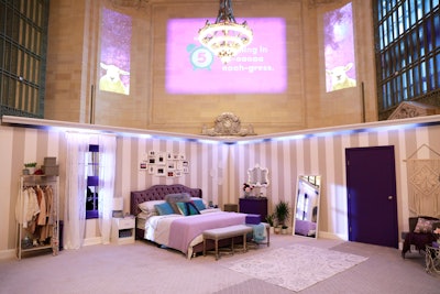 The stunt took place September 30 in Grand Central Terminal's Vanderbilt Hall. The bedroom set featured a color scheme that evoked the SmileDirectClub brand.